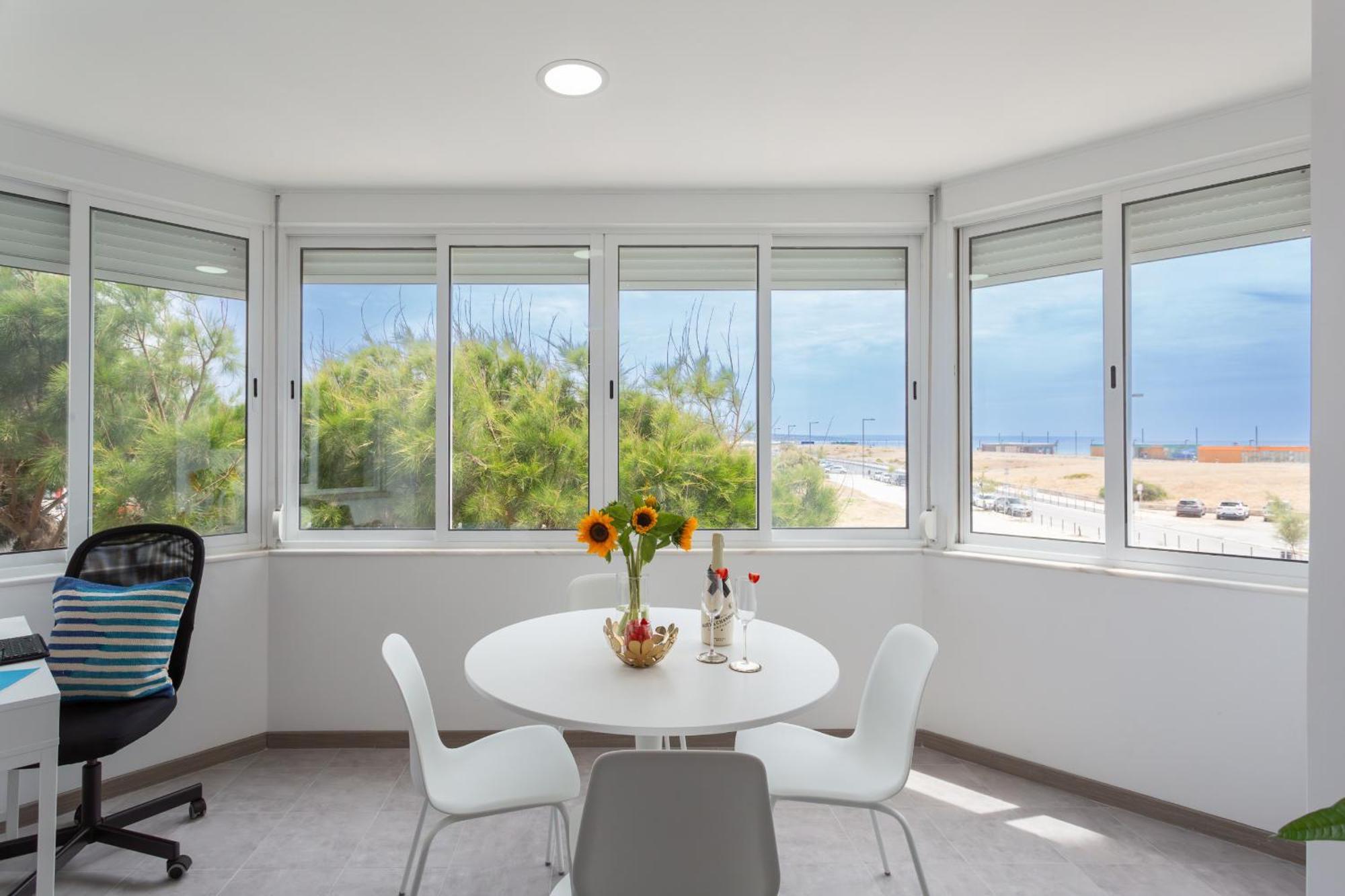 קוסטה דה קפאריקה Beguest Beachfront Apartment Caparica Lisbon מראה חיצוני תמונה